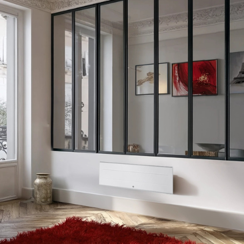 Radiateur chaleur douce Ovation 3 blanc dans un salon