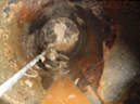 Vue en coupe d'une cuve corrod&eacute;e