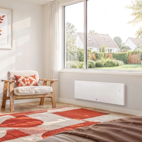 Radiateur chaleur douce Kenya 4 plinthe blanc dans une chambre